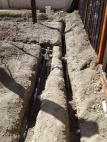 a newly trenched irrigation line